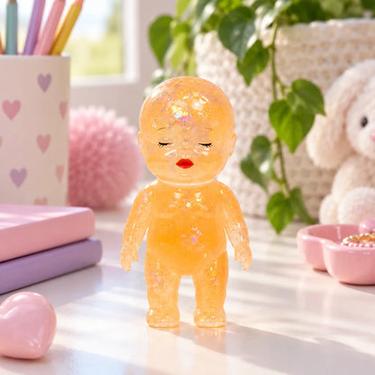 Squishy bébé pailleté surprise